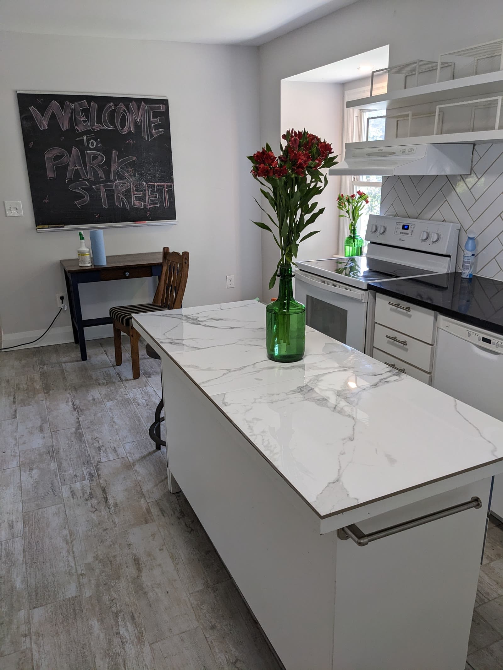 Bright kitchen with a central island at 211 Park Street